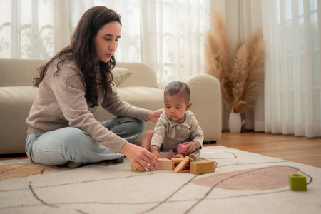 Parents and children relax during their holiday at homeの写真素材