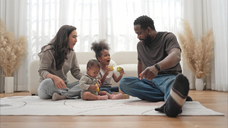 Parents and children relax during their holiday at home