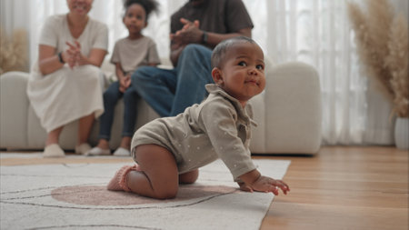 Parents and children relax during their holiday at homeの写真素材