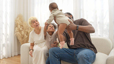 Parents and children relax during their holiday at home