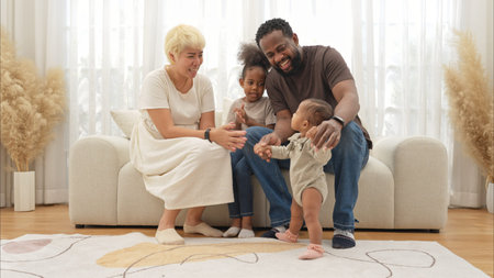 Parents and children relax during their holiday at home
