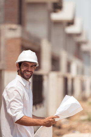 Portrait of engineers inspect and assess the residential home construction site's progressの写真素材