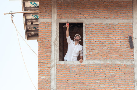 Portrait of engineers inspect and assess the residential home construction site's progressの写真素材