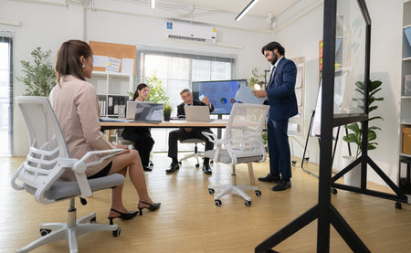 In a contemporary office, a group of senior executives with a mission to approve new projects and monitor the progress of business projectsの写真素材