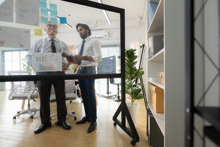 In a contemporary office, a group of senior executives with a mission to approve new projects and monitor the progress of business projectsの写真素材