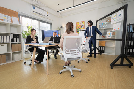 In a contemporary office, a group of senior executives with a mission to approve new projects and monitor the progress of business projectsの写真素材