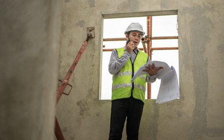 Engineers construction projects inspect and supervise the construction of building walls and...