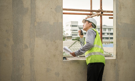 Engineers construction projects inspect and supervise the construction of building walls and...