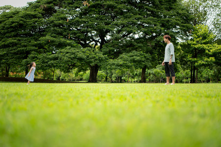 Father and daughter enjoying picnic in the park, Creating joyful outdoor lifestyle moment