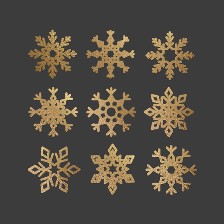 Set of Snowflakes with gold glitter texture. Christmas and New Year icons with shining sparkling light effect. Xmas vector illustrationのイラスト素材