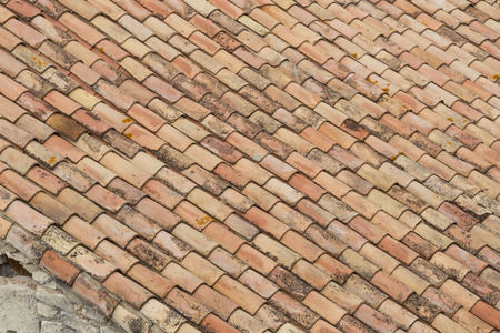 Rooftop Closeup of Weathered Old Clay Tilesの写真素材