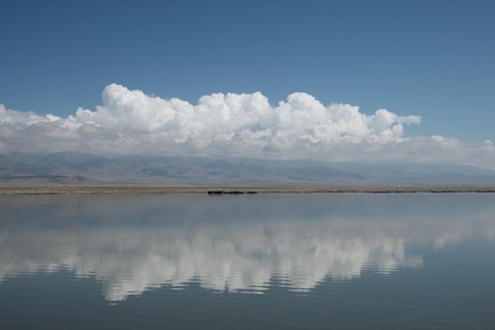 Beautiful scenery with reflection of clouds in the seaの写真素材