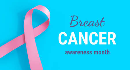 3d Illustration of Pink Realistic Ribbon with Loop. Beautiful Symbol of Breast Cancer Awareness Month Campaign with White Text on Blue Color Background. Design for Poster, Banner, Printの写真素材