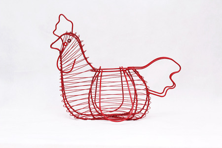 Red Chicken Shape Wire Basketの写真素材