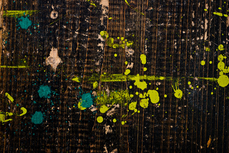 Dirty painted old black wooden desk - background or textureの写真素材
