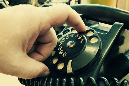 Vintage old telephone with vintage photo effectの写真素材