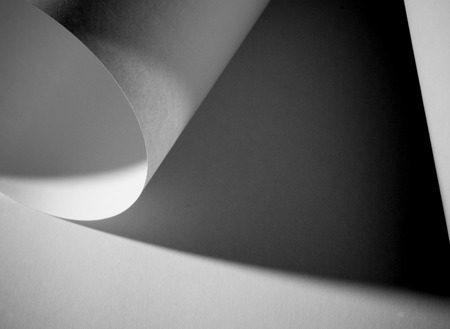 Abstract close up photo of curve shapes made of white paperの写真素材