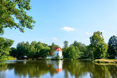 Church on the water in Zwierzyniec, Roztocze region, Polandの写真素材