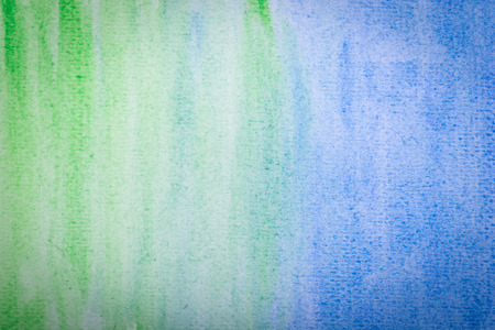Bright blue and green watercolor paper background or textureの写真素材