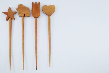 Hair pin made from various forms of wood from Thailandの写真素材