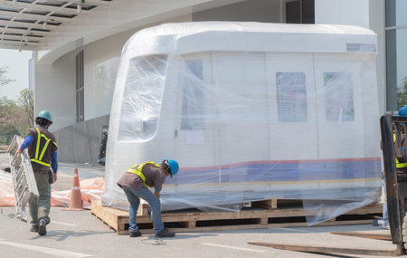 White model train head is on wooden pallet. For simulating driving after the cover is removed. There...