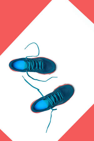 blue sneakers on a white isolated backgroundの写真素材