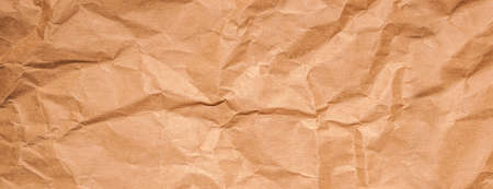 panorama texture of old yellow crumpled paperの写真素材