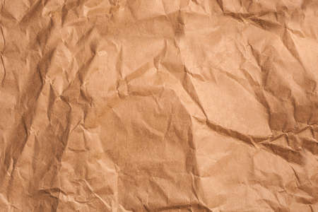 texture of old yellow crumpled paperの写真素材