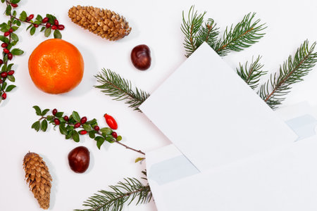 Christmas mockup for postcard with dry fruits, craft paper, gift box, handmade christmas toys