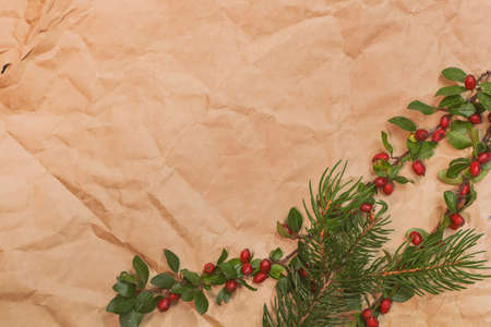 Christmas mockup for postcard with dry fruits, craft paper, gift box, handmade christmas toysの写真素材