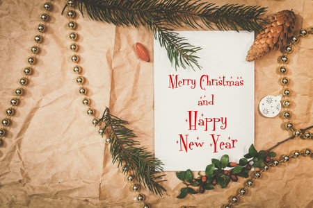 Christmas mockup for postcard with dry fruits, craft paper, gift box, handmade christmas toys