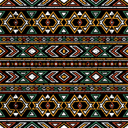 Bright colored seamless pattern in boho chic style. Aztec stylized background with grunge effect. Ethnic print template for fabric and paper.のイラスト素材