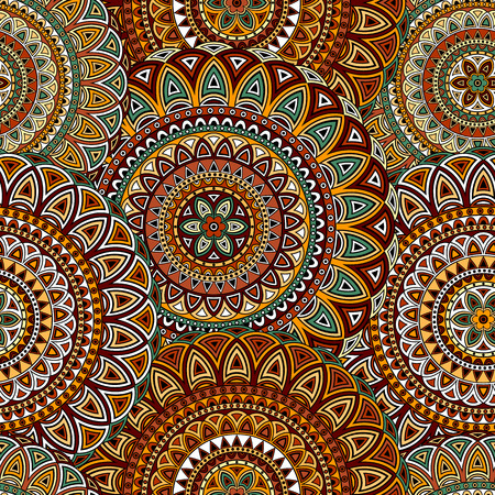 Seamless ethnic pattern with floral motives. Mandala stylized print template for fabric and paper. Boho chic design. Summer fashion.のイラスト素材