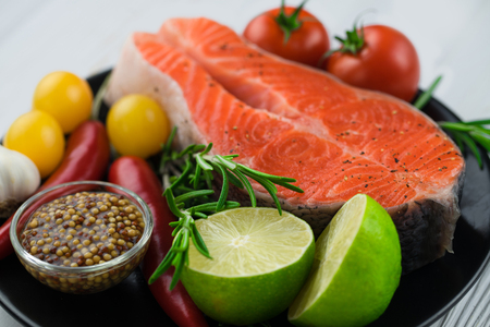 Close up of a raw fresh salmon steak.の写真素材