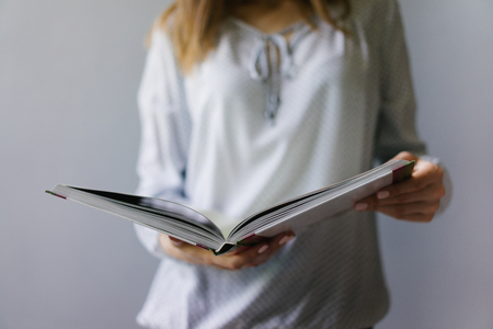 Girl with a bookの写真素材