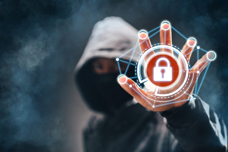 Male hacker accessing to personal information. Hooded man with obscured face touching digital screen...