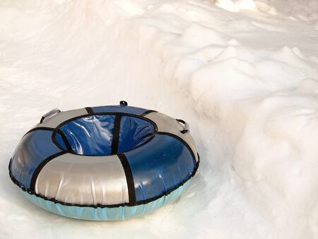 Tubing, an inflatable sled for riding to the ice and snow of the mountains.の写真素材