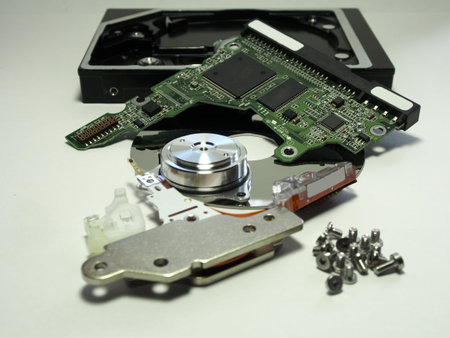 Hard drive, electronic and mechanical parts close-up. Components of electronic devices, macro...