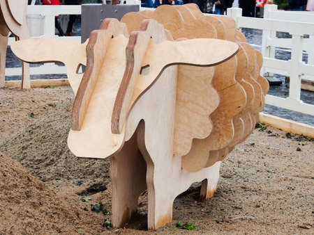 Stylized lamb figurine made of multilayer plywood.の写真素材