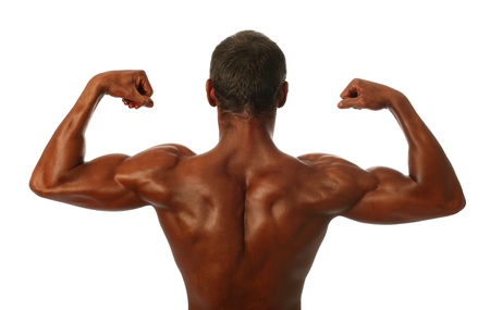 Young bodybuilder showing his biceps isolated on whiteの写真素材
