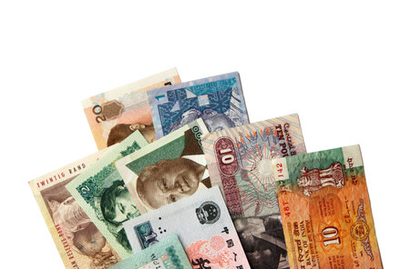 Exotic Asian and African banknotes isolated on white