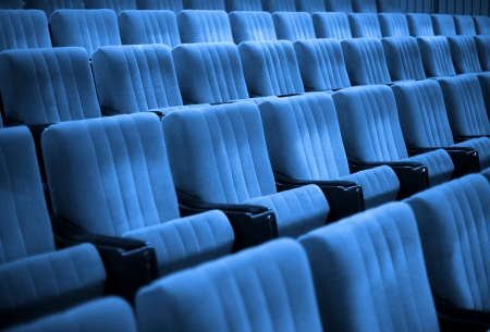 Empty chairs at cinema or theatre  Blue Toneの写真素材