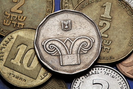 Coins of Israel. Ionic capital of column depicted in the Israeli five new shekels coin.の写真素材