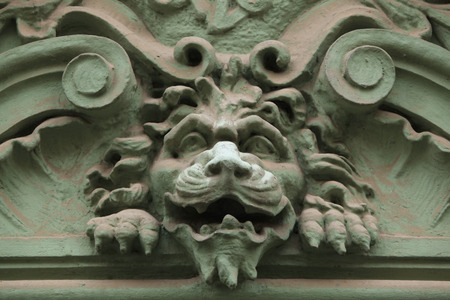 Lion head. Funny mascaron on the Art Nouveau building in Prague, Czech Republic.の写真素材