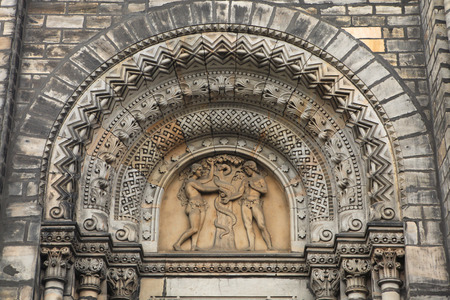 Adam and Eve. Romanesque portal of Saint Cyril and Methodius Church in Prague, Czech Republic.のeditorial素材