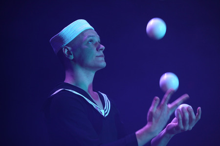 DRESDEN, GERMANY - APRIL 1, 2014: Talented juggler Alexander Koblikov (Ukraine) performs with Russian Grand Circus in Dresden, Germany, on April 1, 2014.のeditorial素材