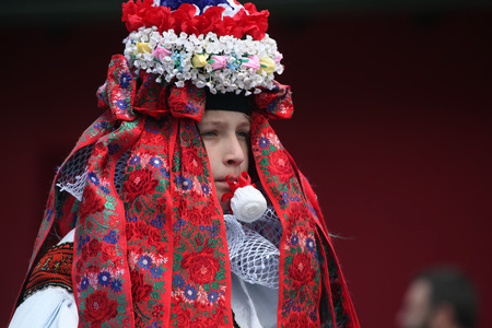 VLCNOV, CZECH REPUBLIC - MAY 26, 2013: Young boy Ondrej Franta elected to play the King attends the Ride of the Kings folklore festival in Vlcnov, South Moravia, Czech Republic.のeditorial素材