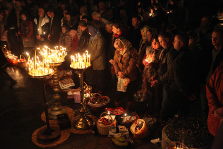 PRAGUE, CZECH REPUBLIC - MAY 5, 2013: Orthodox believers pray during an Orthodox Easter night...