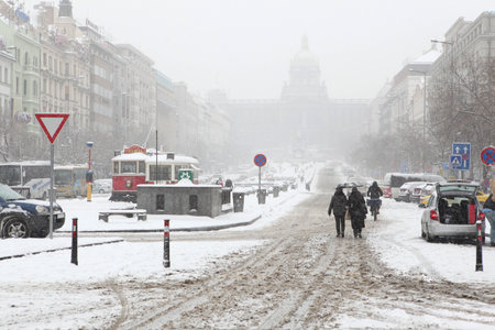 PRAGUE, CZECH REPUBLIC - FEBRUARY 23, 2013: Heavy snowfall covering the National Museum on Wenceslas Square in Prague, Czech Republic.のeditorial素材