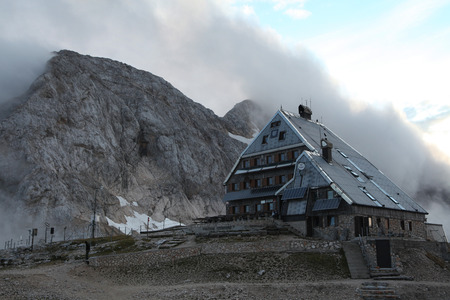 TRIGLAV, SLOVENIA - SEPTEMBER 1, 2011: Triglavski Dom na Kredarici mountain hut (2,515 m) at the foot of Mount Triglav (2,864 m) in the Julian Alps, Slovenia.のeditorial素材